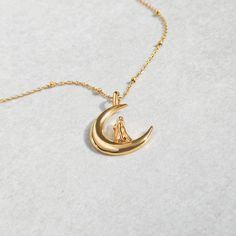 Channel your inner goddess with the Selene necklace. Named after the Greek goddess of the moon, Selene represents femininity, intuition, and the pursuit of knowledge. With its curious and mystical aura, Selene is perfect for those who are on a journey of self-discovery. A piece that will bring out your playful and quirky side (but that still looks and feels classy). DETAILS Choose between Stainless Steel bonded with 18k Gold PVD plating (or) Stainless Steel polished to a silver finish. Pendant l Yellow Gold Goddess Necklace For Gift, Celestial Yellow Gold Charm Necklaces With Moon Phase, Celestial Yellow Gold Moon Phase Charm Necklaces, Symbolic Moon Charm Pendant Jewelry, Yellow Gold Spiritual Charm Necklace With Moon Charm, Spiritual Gold Plated Moon Charm Necklace, Spiritual Gold-plated Necklace With Moon Charm, Spiritual Gold Plated Necklace With Moon Charm, Moon Charm Pendant Necklace