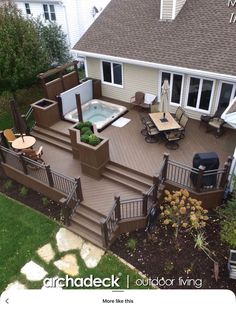 an aerial view of a deck and hot tub