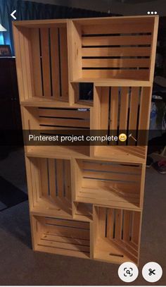 a wooden shelf that has been made out of pallets and some sort of shelving unit