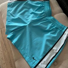 Excellent Condition, Never Worn, Nike Women’s Light Weight Workout Shorts, Aqua, Medium (8-10), Polyester, Inseam 4”, Drawstring. Nike Blue Activewear With Built-in Shorts, Blue Stretch Cotton Swim Trunks, Nike Blue Sporty Shorts, Blue Swim Trunks For Sports With Short Legs, Sporty Light Blue Bottoms For Training, Light Blue Cotton Sports Shorts, Blue Short Leg Swim Trunks For Sports, Blue Cotton Moisture-wicking Shorts, Nike Sports Bottoms In Light Blue