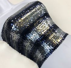 Silver, Navy Blue and Black Striped Sequin Strapless Tube Top is made with high quality sequins on the outside, as well as polyester on the inside. The size of the tube top is 12 inches wide and 10 inches tall when flat. It is also stretchy and form fitting as well. If you have any questions about our products or have any inquiries please contact us and I will be glad to help. *Since this item is hand-made, the design can vary slightly from the image. Blue Bandeau Tube Top For Evening, Evening Blue Bandeau Tube Top, Blue Bandeau Tube Top For Party, Blue Stretch Tube Top For Party, Stretch Blue Tube Top For Parties, Top Bustier, Stage Outfit, Tube Tops, Green Sequins