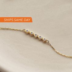 This lovely bezel bracelet gets 5 stars. You know what to choose when you need a tiny touch of diamond to your ensemble. F E A T U R E S * Made to Order. * Gold KT: 14K * Choice of Gold Color: Yellow Gold, Rose Gold, White Gold * Gem Stone: Genuine Diamond * Diamond-Cut: Round * Diamond Carat: 0.05 ct * Charm Height: 4 mm * Charm Width: 16 mm * Diamond Color-Clarity: H Color, SI Clarity * Chain length is adjustable from 6 to 7 inches. * Setting Type: Bezel Setting  * Ready to Ship in 1-3 Busines Diamond Bracelet For Women, Diamond Bar Bracelet, Bezel Bracelet, Bar Bracelet, Rose Gold White, Diamond Bar, Bar Bracelets, Diamond Carat, Gem Stone