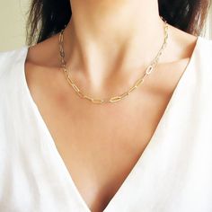 Gold Paperclip Necklace, Link Chain Necklace, 18K Gold Filled Necklace, Layering Necklace ♥Buy 2 Jewelry and Get 1 FREE♥ CODE: GET1FREE Put all 3 items in your cart and apply shop coupon code at checkout. In this way 1 item will be free of cost as you will receive 33% discount.  DESCRIPTION A statement necklace with a link paperclip 18k gold stainless steel chain. The chain is 11.2 x 0.75 mm, made of 18K gold stainless steel. MATERIAL 18K gold stainless steel. Hypoallergenic, lead & nickel free Gold Paperclip Necklace, Paperclip Necklace, Real Flower Jewelry, Gold Filled Necklace, Necklace Layering, Buy Necklace, Link Chain Necklace, Trombone, Layering Necklace