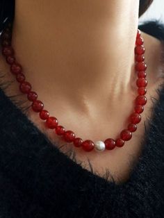 Enhance your style with our stunning Natural Red Agate Necklace and Bracelet set, symbolizing the vibrant energy of the New Year with hues of luck and prosperity. Perfect for the Lunar New Year, these unique pieces feature natural agate beads in shades ranging from translucent tomato red to rich cherry red. Pairing elegance with sophistication, this set is a must-have for the upcoming celebrations. Metal: 18K Recycled Gold Plated On Brass Gemstone: Red Agate/Freshwater Baroque Pearl Pearl/Agate Red 8mm Beads Jewelry For Healing, Red 8mm Beads Healing Jewelry, Red Agate Beaded Necklace With Gemstone Beads, Elegant Carnelian Beaded Necklace With Round Beads, Elegant Carnelian Beaded Necklace With Gemstone Beads, Red Agate Beaded Necklaces, Red Carnelian Bead Jewelry, Elegant Red Hand-strung Jewelry, Red Agate Jewelry With Natural Stones