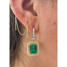 This is part of Chairish’s Fine Jewelry assortment.  7.36 Carat Total Natural Colombian Emerald and Diamond Dangle Drop Earrings.   These dangle drop earrings each feature a natural Colombian emerald, the first with a weight of 3.71 carats and the second with a weight of 3.65 carats. Each emerald earring is paired with additional double diamond halo, including round-cut white diamonds. The bezel-secured diamonds total 0.22 carats, and the emerald surrounding diamonds total 1.57 carats. Crafted f Classic Gia Certified Dangle Jewelry, Gia Certified Luxury Yellow Gold Earrings, Luxury Gia Certified Yellow Gold Earrings, Elegant Gia Certified Gold Jewelry, Luxury 14k Gold Emerald Cut Earrings, Luxury Gold Emerald Cut Diamond Earrings, Luxury Gold Emerald-cut Diamond Earrings, Formal Yellow Gold Diamond And Emerald Earrings, Formal Emerald Cut Yellow Gold Earrings