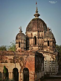 an old building with two domes on top