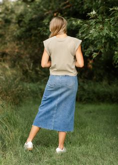 Let us introduce you to the denim skirt you'll want to wear with everything, the Lee A-Line Raw Hem Midi Skirt! This stunning midi denim skirt is an Inherit Design made in the USA! Crafted from high quality, stretchy, medium wash denim that is super soft and will keep you comfortable all day long. The A-line fit is walkable, modest, and on-trend with a raw hem. This sustainable, modest, American-crafted skirt is a true seasonless staple you will wear for years to come! Style | Midi, Denim Color Midi Denim Skirt, Midi Denim, Professional Wardrobe, Church Dresses, Denim Color, Back To School Shopping, Denim Midi Skirt, Colored Denim, Natural Fabrics