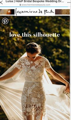 a woman in a wedding dress is walking through the woods with her veil flying over her head