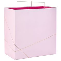 a pink shopping bag with gold lines on the front and sides, hanging from a hook