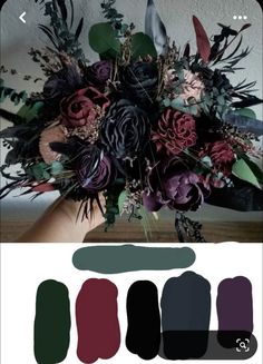 an image of a bouquet with flowers and leaves on the bottom right hand side, in shades of red, purple, black and green