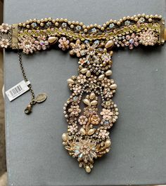 "A work of art from designer MICHAL NEGRIN bracelet is 6.5\" wrist size, the ring finger size is flexible. Pearls, gemstones in gorgeous flower designs. Pink. blue, white and bronze colors are highlighted. Original tag price is $780.00 I am selling at 50% off. Vintage accessory to your classy wardrove." Luxury One-of-a-kind Jewelry For Weddings, Victorian Jeweled Jewelry For Party, Adjustable Victorian Jewelry With Jewels, Unique Formal Jewelry, Adjustable Victorian Style Jewelry With Jewels, Elegant One-of-a-kind Wedding Jewelry, Unique Evening Bracelet Jewelry, Handmade Evening Bracelet Jewelry, Unique Decorative Jewelry For Wedding