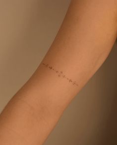 a woman's arm with writing on it