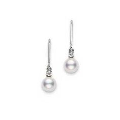 From MIKIMOTO, these drop earrings each feature a 7mm A+ quality Akoya cultured pearl and a round diamond, set in 18k white gold. Diamonds are 1/15ctw, G in color and VS in clarity. MIKIMOTO Style #: PEA1006DW Formal Fine Jewelry Diamond Earrings With Ear Wire, Classic White Gold Pearl Earrings For Formal Occasions, Classic Akoya Pearl Earrings For Anniversary, Classic White Gold Akoya Pearl Earrings, Classic Akoya Pearl Earrings With Brilliant Cut, Classic Diamond White Dangle Pearl Earrings, Formal Fine Jewelry Pearl Earrings With Ear Wire, Classic White Gold Diamond Earrings With Akoya Pearls, Classic Formal Earrings With Ear Wire