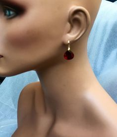 "Burgundy Garnet gold pave earrings. Heart cut garnets. Red stone jewelry. Red garnet dangles. Dark red garnet drops. Junuary birthstone. Available in 3 finishes. Length 1 1/4\". Dark red faceted gems are 14x14 mm as photo are sold, 19x14 mm and 13x17 mm stones are available. These beautiful earrings will arrive in a jewelry box ready for gift giving." Red Stone Jewelry, Garnet And Gold, Faceted Gems, Red Stone, Red Garnet, Dark Red, Stone Jewelry, Beautiful Earrings, Garnet