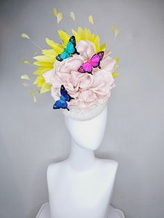 From the 2024 Featured Milliner of the Kentucky Derby Museum    Gorgeous Kentucky Derby hat fascinator  kentucky derby hat fascinator white sinamay blush large satin flower yellow feathers and rainbow pink blue green butterflies  headband attachment.  each hat is totally one of a kind! no two are alike! I can probably add feathers, flowers etc to existing hats for a small fee. I cannot remove anything from existing hats. Just message me and see if we can make it work! :) I cannot make custom ord Blue Feathered Fascinator For Kentucky Derby, Vintage Blue Hat For Kentucky Derby, Vintage Kentucky Derby Hat With Flower Shape, Flower-shaped Fascinator For Kentucky Derby Church Occasions, Kentucky Derby Hats Diy, Derby Hats Diy, Flower-shaped Fascinator For Kentucky Derby, Derby Hats Fascinators, Yellow Feathers