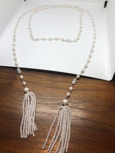 Gorgeous and delicate hand wrapped Freshwater Pearl necklace Huge pearls in tassel design All jewelry is shipped in a nice gift box. Check out our over a THOUSAND great reviews Elegant Handmade Tassel Necklace With Round Beads, Elegant Jewelry With Tassels And Round Beads, Elegant Tassel Necklace With Round Beads As Gift, Elegant Beaded Dangle Lariat Necklace, Elegant Beaded Lariat Necklace Gift, Elegant Beaded Lariat Necklace For Gift, Elegant Beaded Lariat Necklace As A Gift, Elegant Tassel Necklace As Gift, Elegant Tassel Necklace