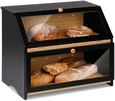 bread and loaves displayed in wooden display case