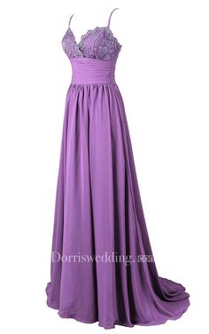 a long purple dress with lace on the top