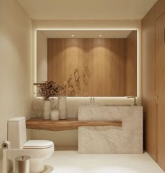 a white toilet sitting next to a wooden shelf in a bathroom under a light fixture