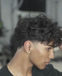 Different & Trendy Undercut Hairstyle Ideas for Men | Every Variation of the Men’s Undercut Hairstyle (Detailed Gallery) Haïr Style For Wavy Hair Men, Middle Wavy Haircut, Curly Wavy Haircut Men, Low Fade Middle Part Men, Taper Fade Wavy Hair Men, Middle Part Fade Hairstyles Men, Nice Haircuts For Boys, Low Taper Fade Haircut Curly Hair Men, Long Hair With Taper Fade