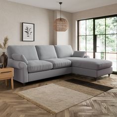 a living room with a blue couch and rug