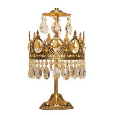 a golden chandelier on a white background with lots of crystal beads hanging from it's sides