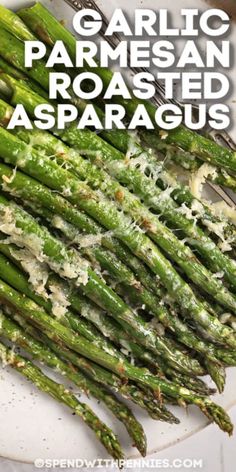 garlic parmesan roasted asparagus on a white plate with text overlay