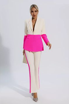 a woman in a pink and white suit is standing on a white background with her hands behind her back