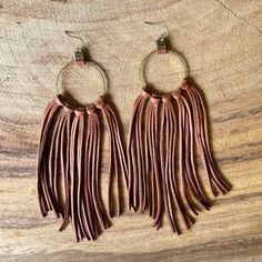 "Gorgeous tassel earrings in silky soft deer lace and sterling silver. Drop from top of earring to bottom is 6\". These have 5 knotted tassels instead of 7, so there's a little less width - for those who like the look but prefer less under the ear! These are hand-cut and knotted with the softest deer leather lace I could find. Every detail was considered - even the deer lace loops attaching the hammered bronze hoops to the ear wires. There simply is no better. These are way better than stiff lea Rustic Cross, Deer Hide, Cotton Necklace, Country Chic Wedding, Bronze Earrings, Bridal Party Gifts, Great Christmas Gifts, Leather Lace, Tassel Earrings