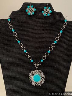 A beautiful and exclusive set with necklace and earrings, the set is wire wrapped and the beads hand crimped, using beautiful hand painted glass bead and some glass beads. Something to highlight: the pendant is a turquoise howlite set in crochet, using the exclusive Peruvian stitch  The set is made with high quality glass beads and professional wire. Every single chain and charm is handmade, even the clasps. The necklace measures approx. 42 cm. An elegant timeless accessory for any occasion. * T Handmade Wire Jewelry For Jewelry Making, Handmade Turquoise Dangle Necklace, Handmade Turquoise Silver Plated Wire Jewelry, Handmade Turquoise Jewelry In Silver Plated Wire, Handmade Bohemian Silver Plated Wire Jewelry, Handmade Elegant Round Turquoise Necklace, Elegant Round Turquoise Handmade Necklace, Elegant Handmade Round Turquoise Necklace, Elegant Round Handmade Turquoise Necklace