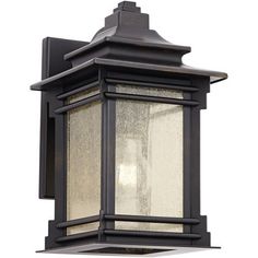 an outdoor wall light with frosted glass on the top and bottom panel, in dark bronze finish