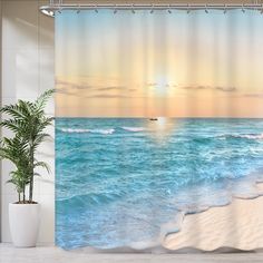 the sun is setting over the ocean shower curtain