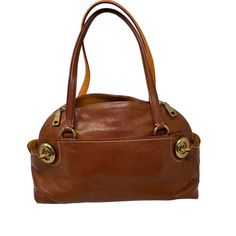 Coach Grain Leather Outlaw Satchel Shoulder Bag 38188 Saddle Brown Ot-20415 This Coach Outlaw Satchel Shoulder Bag 38188 In Saddle Brown Is A Stylish Accessory For Any Casual Or Business Occasion. The Bag Has A Zip Closure, Double Handles, And A Strap Drop Of 7.5 Inches. It Is Made Of High-Quality Leather With A Grain Finish And Features Buckle Accents, Stitching, And A Zipper For Added Security. The Bag Is Large In Size, Measuring 15 Inches In Length, 9 Inches In Height, And 7 Inches In Depth. Saddle Brown, Find Color, In Depth, Tan Color, Stylish Accessories, High Quality Leather, Brown Gold, Coach Bags, Accessories Design