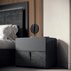 a black and white photo of a bed in a bedroom