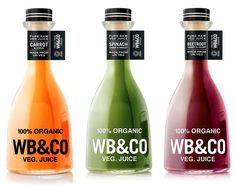 three bottles of different types of juices on a white background with the words organic, v & co and veg juice