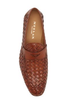 A woven upper and geometric penny keeper add modern elements to a sophisticated leather loafer featuring a slender moc toe. Cushioned footbed Leather upper, lining and sole Made in Spain Elegant Business Loafers With Woven Sole, Elegant Woven Leather Loafers, Elegant Woven Leather Slip-on Loafers, Classic Woven Leather Loafers, Classic Woven Leather Loafers With Round Toe, Classic Slip-on Woven Leather Loafers, Classic Woven Leather Slip-on Loafers, Classic Formal Moccasins With Woven Sole, Classic Loafers With Woven Sole And Almond Toe