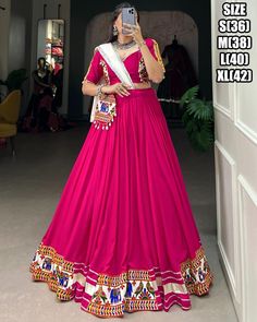 Navratri Wear Pure Rayon Plain With Gamthi Work Gujarati Gamthi Chaniya Choli For Festivals, Indian Traditional Lehenga Choli For Raas Garba Fabric Details -  * Lehenga - Pure Rayon Plain (Full Inner) * Inner - Micro Cotton * Blouse - Rayon Plain * Dupatta - Pure Rayon Plain (2.5 Meter) * Purse - Plain And Gamthi Work With Cowrie (Kodi) Lace Touch-Up . Type - Stitched Size - Mention On Photo Work - * Lehenga - Gamthi Work And Gota Pati Lace Border Stitched With Canvas              * Blouse - Gamthi Work With Gota Patti And Cowrie (Kodi) Lace Touch-Up              * Dupatta - Lace Border              * Purse - Plain And Gamthi Work With Cowrie (Kodi) Lace Touch-Up Length - Max Up To 42 Flair - 3.80 Meter Weight - 2 Kg Occasion - Navratri Special, Festive Wear Washing Instruction - Dry Wash Gamthi Chaniya Choli, New Lehenga Choli, Garba Chaniya Choli, Gamthi Work, Lehenga Choli Latest, Navratri Lehenga, Garba Dress, Fancy Lehenga, Lehenga Choli Designs