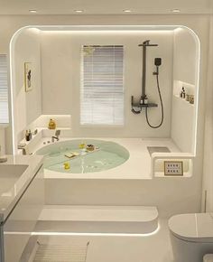 a bath room with a sink a toilet and a tub