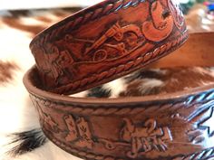 Belt has Owen stamped on it.buckle is detachable/call is 3 inches in length 1 1/2 inches in height/leather is 1 1/4 inch in width.leather is 33 inches in length with holes between 26 to 30 Adjustable Brown Traditional Belt Buckles, Southwestern Hand Tooled Leather Belt Buckles, Southwestern Hand Tooled Leather Belt, Southwestern Style Hand Tooled Leather Belt, Leather Belt Buckles For Rodeo, Traditional Adjustable Brown Belt Buckles, Rustic Hand Tooled Adjustable Belts, Traditional Adjustable Hand-tooled Belt, Traditional Adjustable Concho Belt