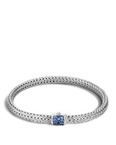 A classic chain bracelet in sterling silver with a blue sapphire-embellished station by John Hardy. Classic Blue Sterling Silver Bracelet, Elegant Blue Sterling Silver Chain Bracelet, Blue Sapphire Jewelry, John Hardy Jewelry, Small Bracelets, Sapphire Bracelet, John Hardy, Sapphire Jewelry, Blue And Silver