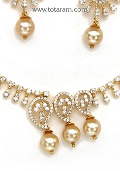 18 Karat Gold Diamond Necklace & Earrings Set with Pearls
    - 235-DS718 - in 25.700 Grams for USD $4134.84. 
Made in India by Totaram Jewelers Online this product is in Gold - 18 Karat Gold  & is an excellent gift for Adult - Women. Ships fully insured with secured guaranteed delivery for free with your order over $250 from New Jersey USA & comes with 30 days exchange policy. Gold Diamond Necklace, South Sea Pearls, Sea Pearls, South Seas, Stunning Jewellery, Gifts For Adults, Necklace Earring Set, Necklace Earrings, Earrings Set