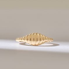 The 14k Solid Gold Line Signet Ring is a sleek and minimalistic jewelry piece designed for women. This slim pinky ring serves as an everyday statement ring, ideal for those who appreciate subtle yet elegant jewelry. Features * Made to Order. * Gold KT: 10K, 14K, 18K * Custom Gold Color: Rose Gold, Yellow Gold, White Gold * Width of Band: 1.53MM * Top of Band: 7.20MM * Thickness of Band: 1.23MM * Ready to Ship in 5-7 Business Days ✓ We care about the environment,the jewelry we cast is made with recycled gold. We source exclusively post-consumer material that is refined back to their pure elements to ensure that the gold is in the same quality. Our designs are made from 14k/18k/10k real solid gold ✓ We care about customer satisfaction and long-term relationship so our designs are made by con Minimalistic Jewelry, Small Ring, Ring Simple, Tiny Diamond, Gold Line, Small Rings, Pinky Ring, Rings Simple, Polish Jewelry