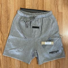 Small Dark Oatmeal Fear Of God Essential Shorts Brand New! Size Small Comes W Tag And Packaging! #Fearofgod #Fearofgodessentials #Essentialsshorts Fear Of God Shorts, Essential Fear Of God, Sweat Shorts Men, Essentials Shorts, Essential Shorts, American Apparel Shorts, Drip Outfit Men, Devin Booker, Fear Of God Essentials