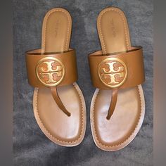 Brand New Never Worn Size 11 Color: Royal Tan (Freddy) Tan Sandals With Leather Footbed And Round Toe, Tan Leather Sandals With Round Toe, Tan Sandals With Leather Footbed, Designer Tan Sandals With Round Toe, Navy Blue Wedges, Tory Burch Espadrilles, Logo Flip Flops, Blue Flip Flops, Miller Sandal