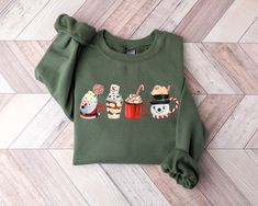 Holiday Coffee Shirt, Christmas Sweatshirt, Cute Xmas Shirts, Christmas Crewneck, Cute Holiday Tops, Holiday Sweater, Hot Cocoa Sweatshirt DETAILS Bella+Canvas Greenwich Unisex T-shirt 4.2 oz.(US) 7 oz.(CA), 100% airlume combed and ringspun cotton, 32 singles Retail fit Unisex sizing Coverstitched collar and sleeves Shoulder-to-shoulder taping Side seams Tear-away label Fabric Profile : Ash is 99/1 airlume combed and ringspun cotton/polyester GILDAN CREWNECK SWEATER Features 8 oz., 50% cotton, 50% polyester Safety Orange is compliant with ANSI - ISEA 107 High Visibility Standards 1x1 ribbed collar, cuffs and waistband with spandex Double-needle stitching throughout Pill-resistant air jet yarn Set-in sleeves WASHING INSTRUCTIONS Please wash us inside out in cool water + for best results dry Coffee Christmas, Coffee Sweatshirt, Animal Christmas, Cute Christmas Gifts, Xmas Shirts, Coffee Shirts, Holiday Sweater, Holiday Shirts, Cute Christmas