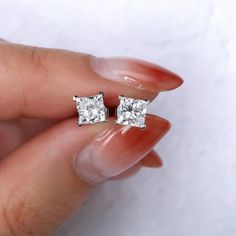 Moissanite Princess Cut Earrings, 14K Gold Diamond Stud Earrings for Womens, Mens Earrings, wedding gift for her, moissanite Stud earrings, bridal earrings, Moissanite Diamond Earrings, Silver stud earrings, lab diamond earrings, square diamond earrings, cz stud earrings Item Details * Made to Order. * Stone Type: Moissanite / Simulated Diamond * Stone Shape: Princess cut  * Gold : 925/ 10K/ 14K/ 18K Solid Gold * Custom Gold Color: Rose Gold, Yellow Gold, White Gold * Stone size : 7.00 MM 2pcs * Stone Total CTW: 4.00 ctw * Diamond Color Clarity: VVS/ White  RocksjewelleryUS is one of the biggest manufacturers of loose moissanite as well as a moissanite engagement ring, wedding ring, vintage engagement ring, wedding Bands and ring sets, anniversary rings, wedding ring sets, bridal sets, ant Gia Certified Silver Diamond Earrings For Gift, Round Cut Moissanite Earrings For Gift, Moissanite Round Cut Earrings For Gift, Gift Moissanite Earrings With Round Cut, Gia Certified Lab Grown Diamond Earrings For Gift, Gia Certified Lab Grown Diamond Earrings As Gift, Gia Certified Moissanite Diamond Earrings For Gift, Gift Moissanite Diamond Earrings With Prong Setting, Gift Moissanite Diamond Earrings Gia Certified