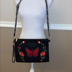 Black Bags With Floral Embroidery For Spring, Everyday Use Black Bag With Floral Embroidery, Black Bag With Floral Embroidery For Everyday Use, Black Clutch Bag For Spring, Black Spring On-the-go Bags, Black Embroidered Clutch Bag, Embroidered Bag, Zipper Pocket, Black Red