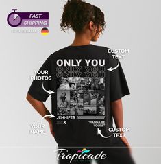 the back of a woman's black t - shirt with an image of people on it