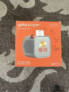 an orange box with the words yoto player on it