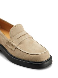 beige calf suede leather lining mini logo tag penny slot moc stitching almond toe branded leather insole flat rubber sole Classic Beige Loafers With Stitched Sole, Classic Beige Moccasins With Rubber Sole, Beige Suede Loafers With Stitched Sole, Beige Suede Moccasins For Work, Formal Beige Moccasins With Suede Lining, Beige Suede Loafers With Suede Lining, Beige Suede-lined Moccasins For Work, Classic Beige Suede Loafers, Beige Loafers With Suede Lining For Workwear